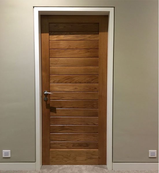 Flush architrave solid oak door - Timber Treat Ltd
